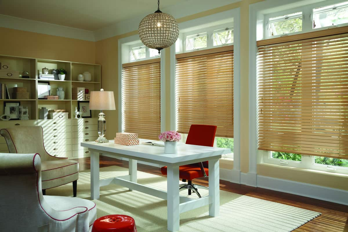 Wood blinds with rich stain in a home office